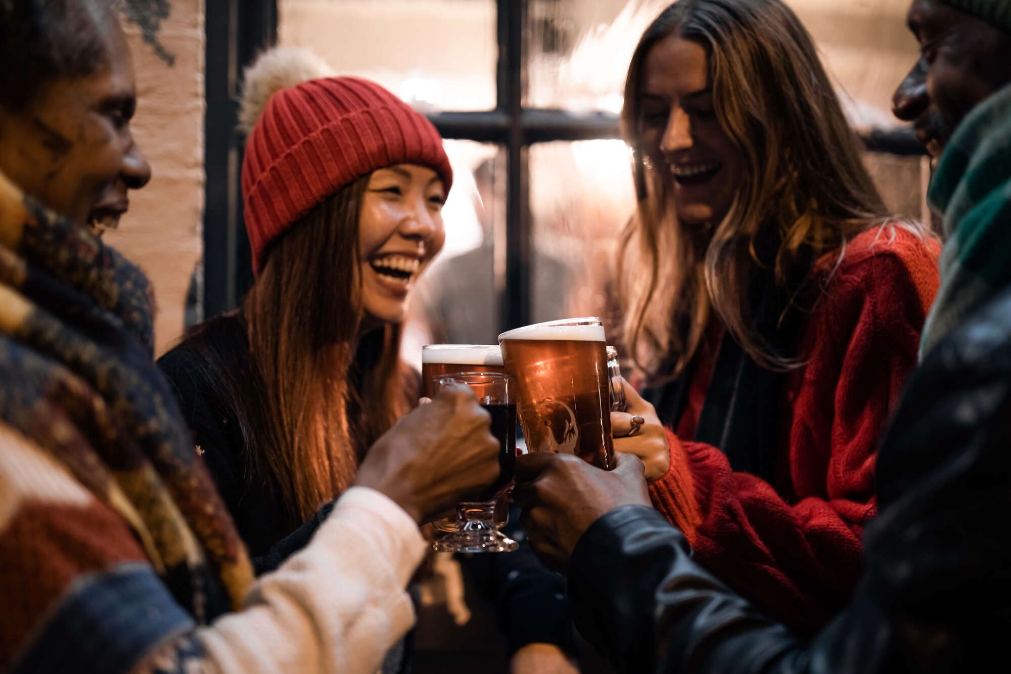 Festive drinks with friends and family in a heated Young's pub garden