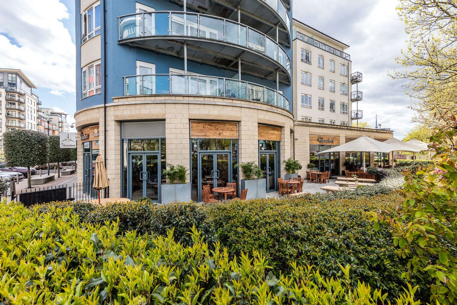 Exterior image of the Beaufort pub showcasing their pub garden