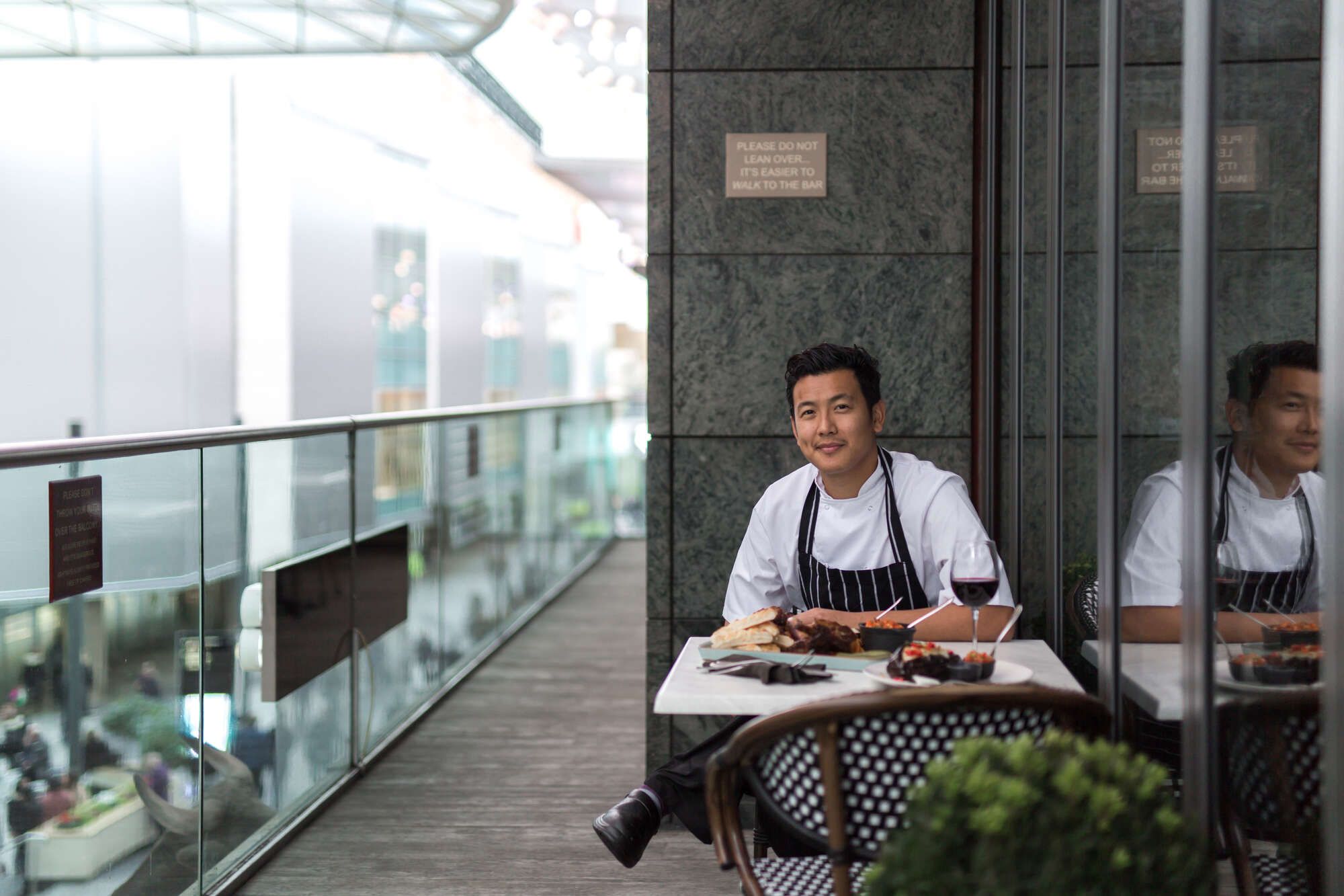 Chef sat outside on the terrace at The Bull