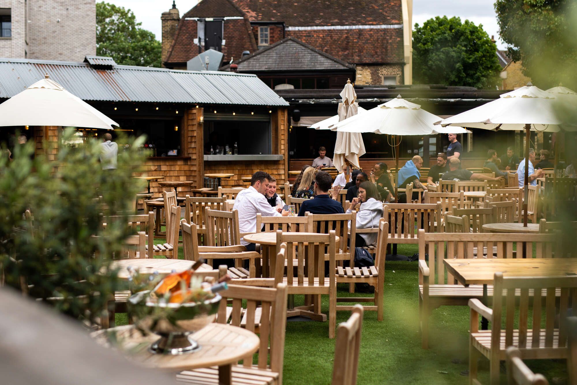 People eating in a pub beer garden