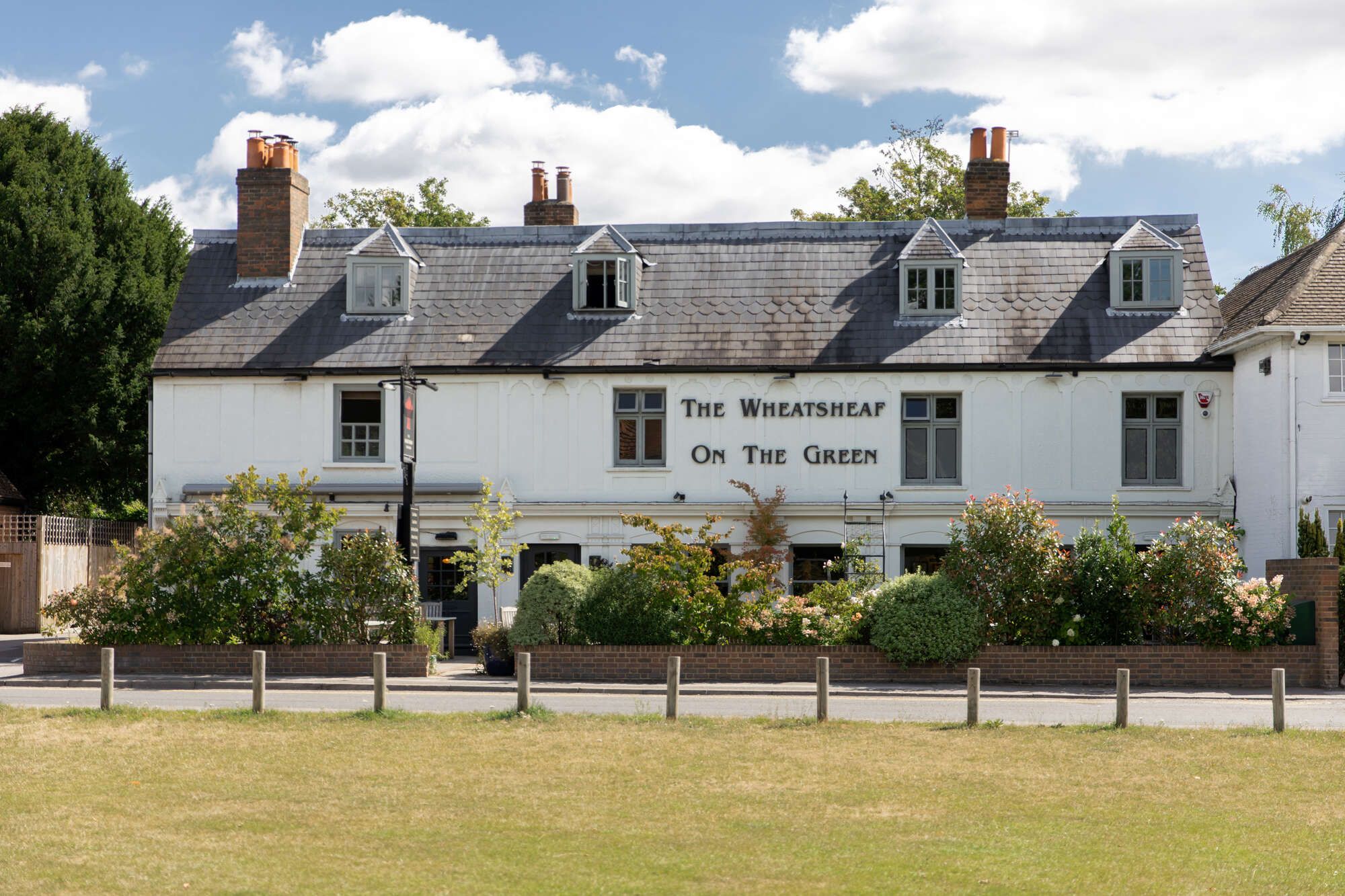 Exterior of the Wheatsheaf on Esher Green