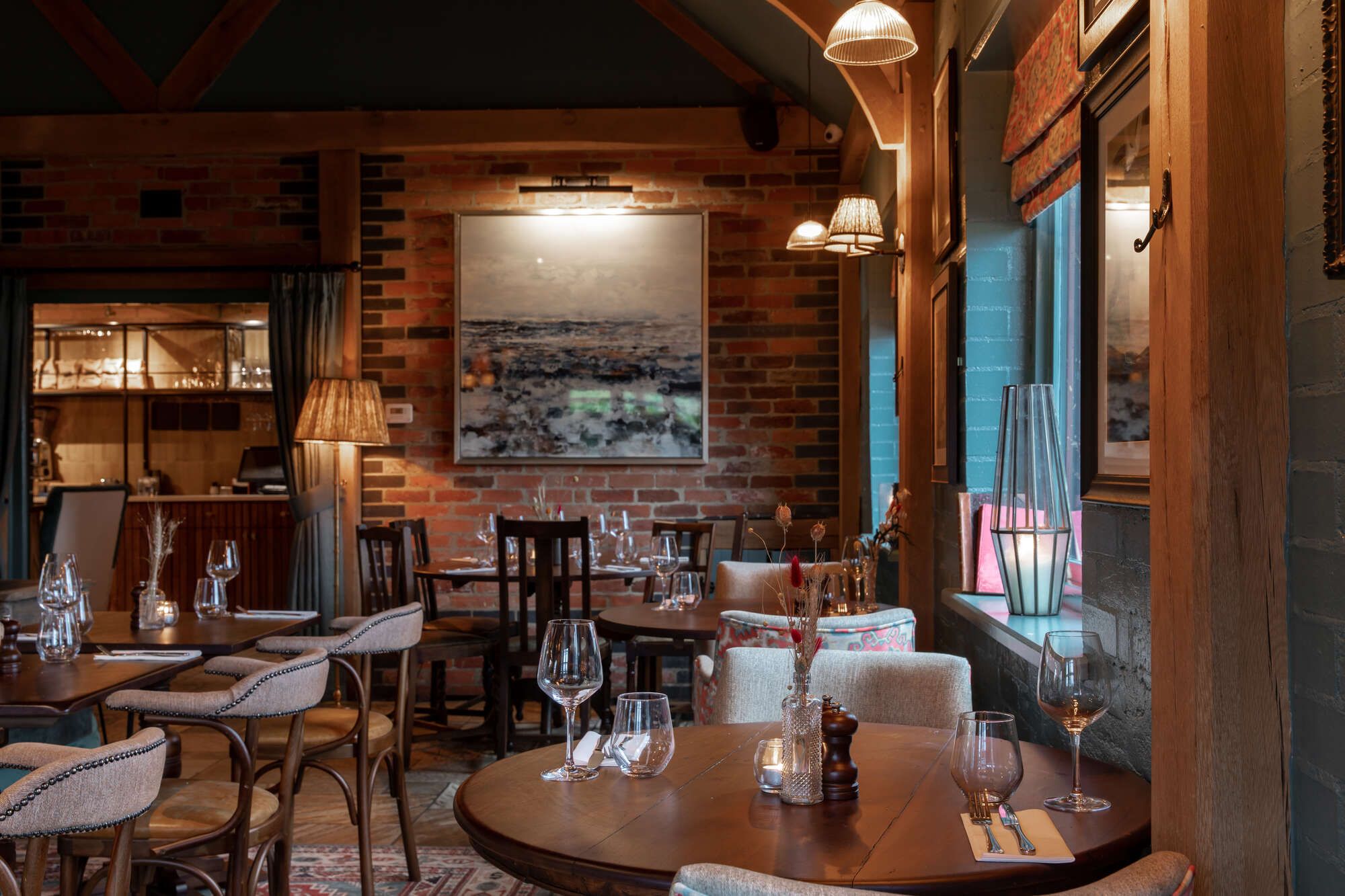 Cosy and traditional interiors of the Half Moon pub in Windlesham